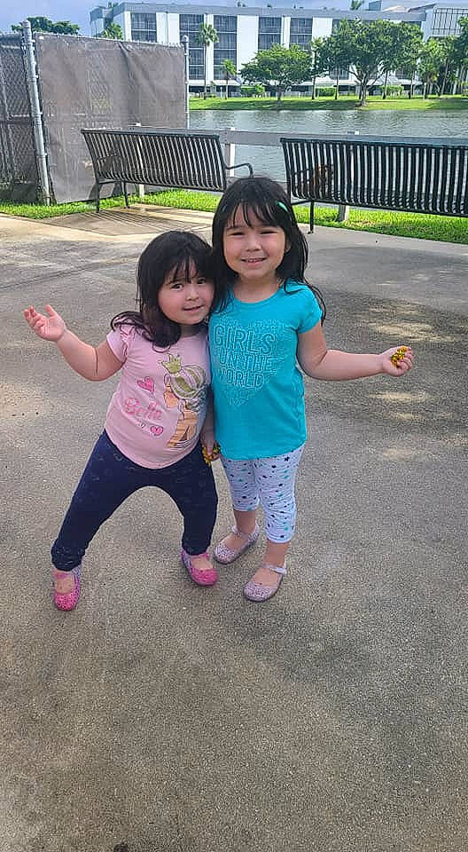 Valeria is registered to the contest to win money with this photo: child, friendship, fun, gesture, happy, joy, leisure, person, pink, play, recreation, sibling, skin, smile, snapshot, summer, toddler, vacation