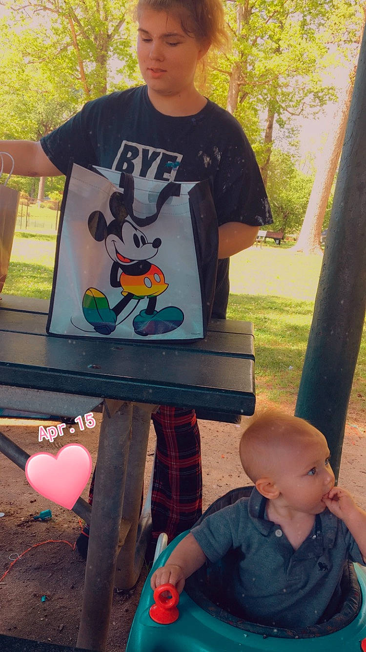 Violet joined the competition — help win amazing prizes! art, child, cool, eyewear, fun, grass, green, happy, leisure, people, person, plant, recreation, sitting, summer, t_shirt, table, toddler, tree, vertebrate