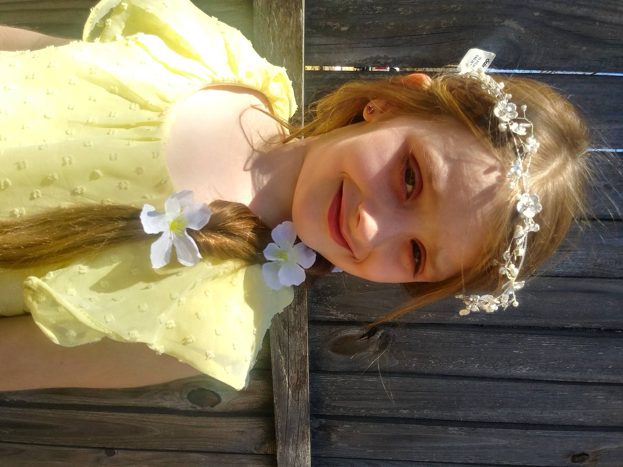 Kaylie is registered to the contest to win money with this photo: child, cut_flowers, fashion_accessory, flash_photography, floral_design, floristry, flower, flower_arranging, fun, grass, hair_accessory, happy, headpiece, joy, person, petal, portrait_photography, sky, smile, sweetness