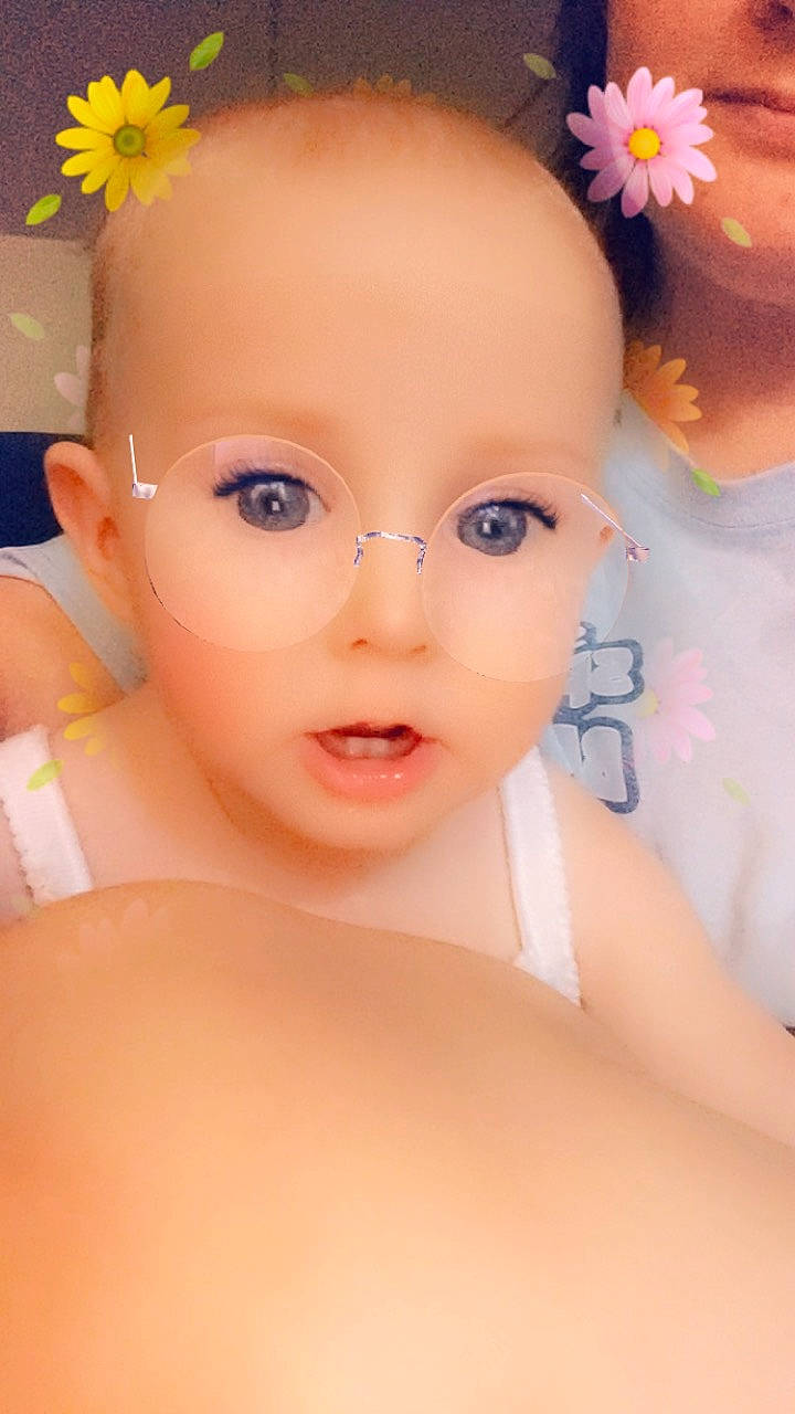 Islah is registered to the contest to win money with this photo: baby, beauty, cheek, child, close_up, eye, eyelash, face, forehead, head, lip, person, pink, plant, skin, smile, toddler