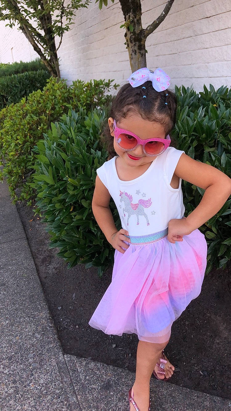 Tessa is registered to the contest to win money with this photo: baby_toddler_clothing, child, clothing, costume, dress, fun, grass, joy, person, pink, plant, shoe, summer, toddler, vacation