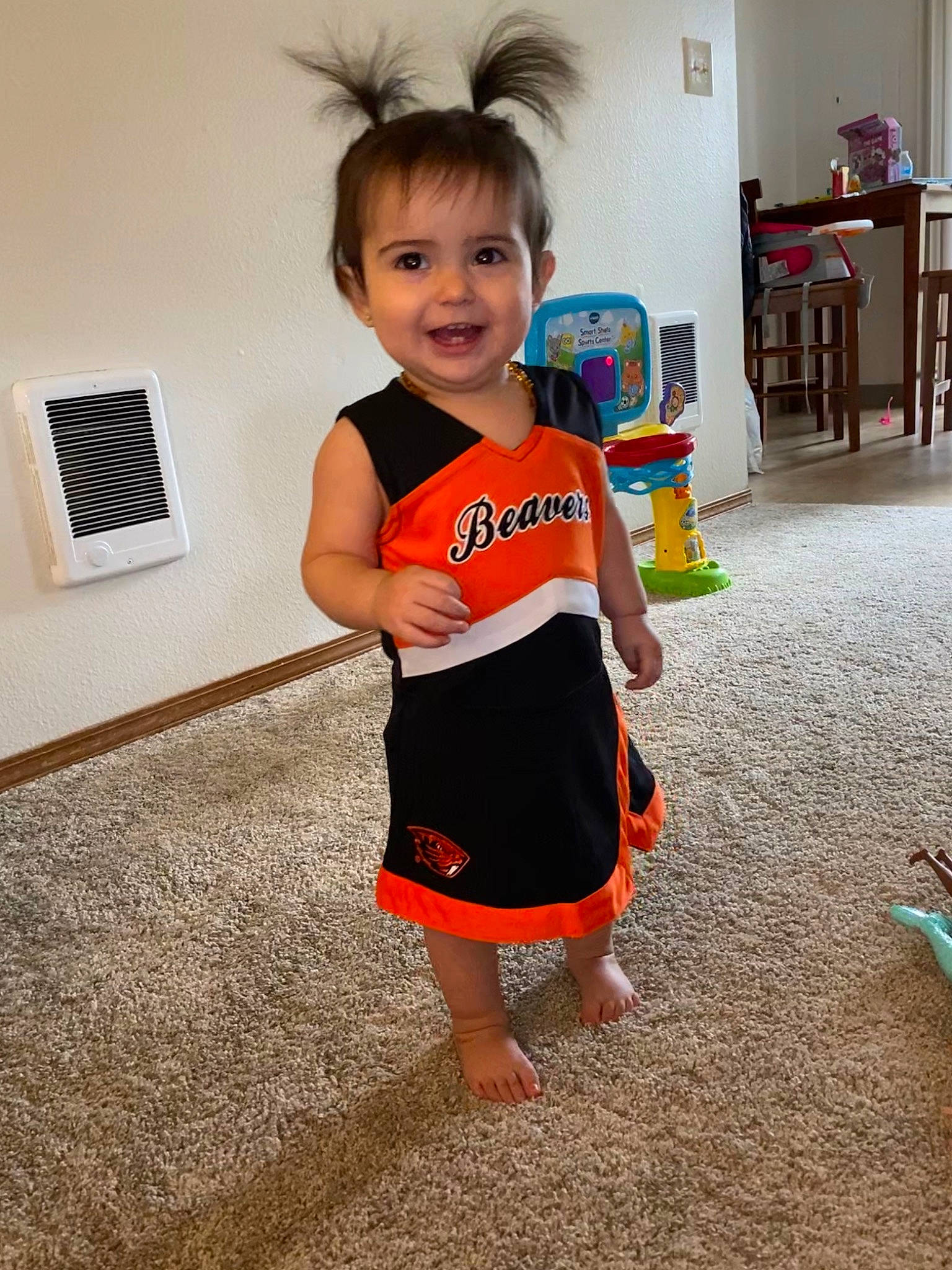 Jayde is registered to the contest to win money with this photo: arm, baby, baby_toddler_clothing, child, dress, face, floor, flooring, head, joint, joy, leg, person, play, shoulder, skin, smile, standing, summer, t_shirt