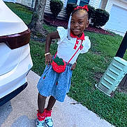 Jaliyah joined the competition — help win amazing prizes! child, girl, smiling, outdoor, sidewalk, grass, car, tree, bushes, house, purse, fashion, red_bow, braids, sneakers, skirt, bracelet, happy, portrait, casual