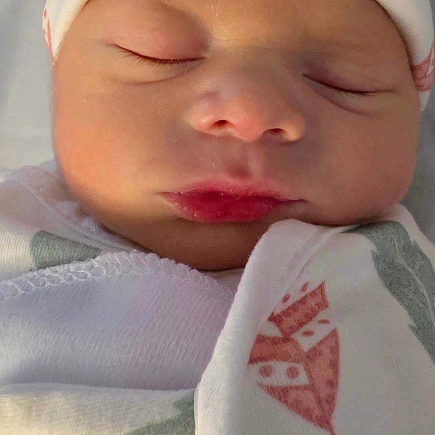 Glen Mateo joined the competition — help win amazing prizes! newborn, baby, sleeping, blanket, hat, infant, face, peaceful, soft_light, wrapped, closeup, child, cute, indoors, portrait, skin, headwear, cozy, resting, calm