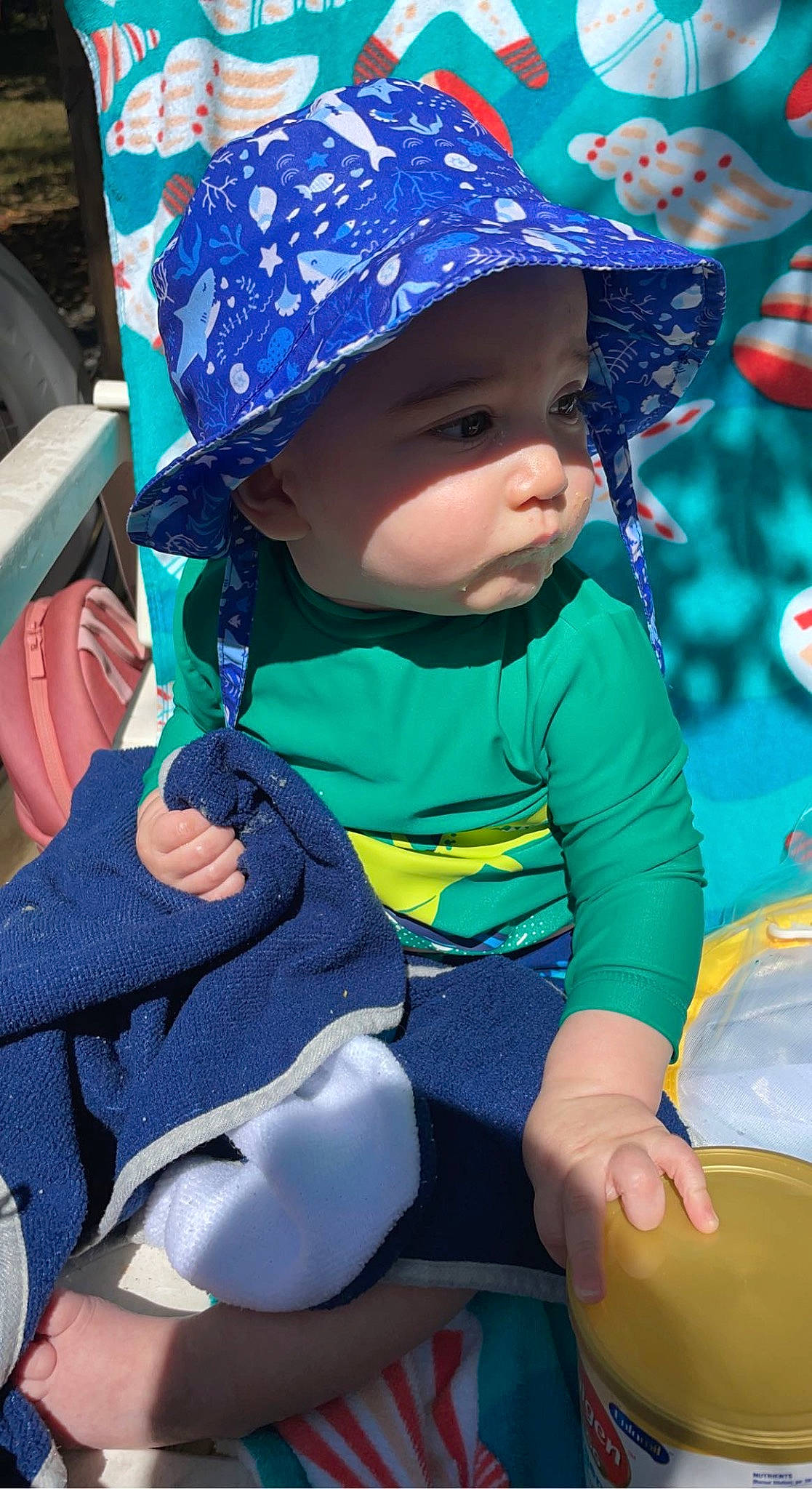 Reid is registered to the contest to win money with this photo: azure, baby, baby_toddler_clothing, blue, cap, child, electric_blue, fashion_accessory, fun, happy, hat, leisure, magenta, photograph, product, purple, recreation, snapshot, toddler, tree