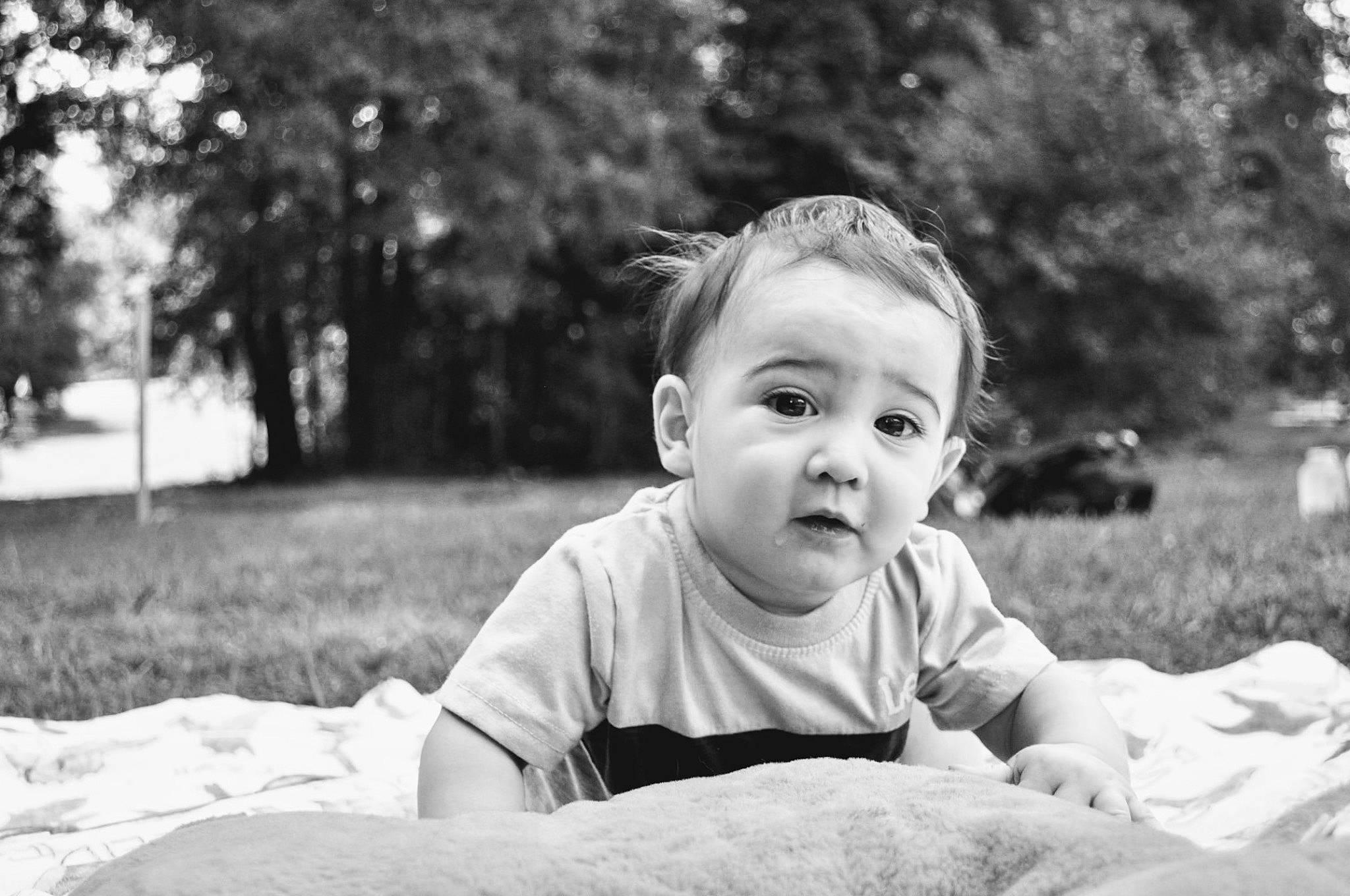 Reid joined the competition — help win amazing prizes! baby, baby_toddler_clothing, black_and_white, child, comfort, flash_photography, fun, grass, happy, laugh, monochrome, monochrome_photography, people_in_nature, person, plant, sitting, smile, stock_photography, t_shirt, toddler