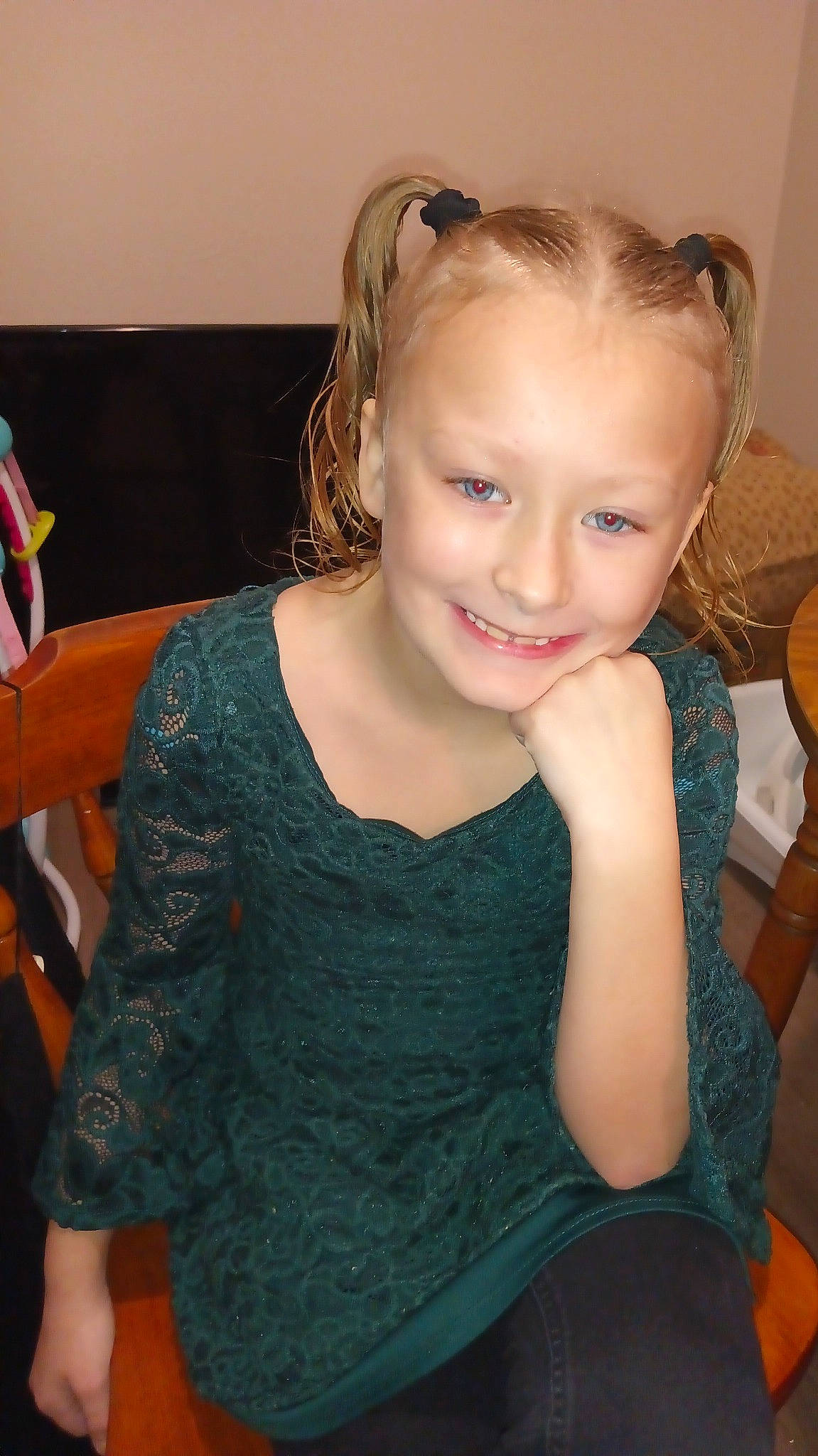 Amy is registered to the contest to win money with this photo: beauty, brown_hair, chair, cheek, child, ear, eyelash, facial_expression, flash_photography, fun, hair, happy, head, human_body, iris, joy, long_hair, neck, person, shoulder