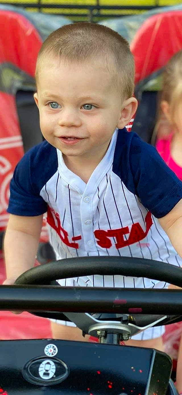 Colten joined the competition — help win amazing prizes! automotive_exterior, automotive_tire, child, electric_blue, fun, grass, joy, leisure, mammal, motor_vehicle, muscle, organ, person, player, product, recreation, smile, sportswear, t_shirt, team