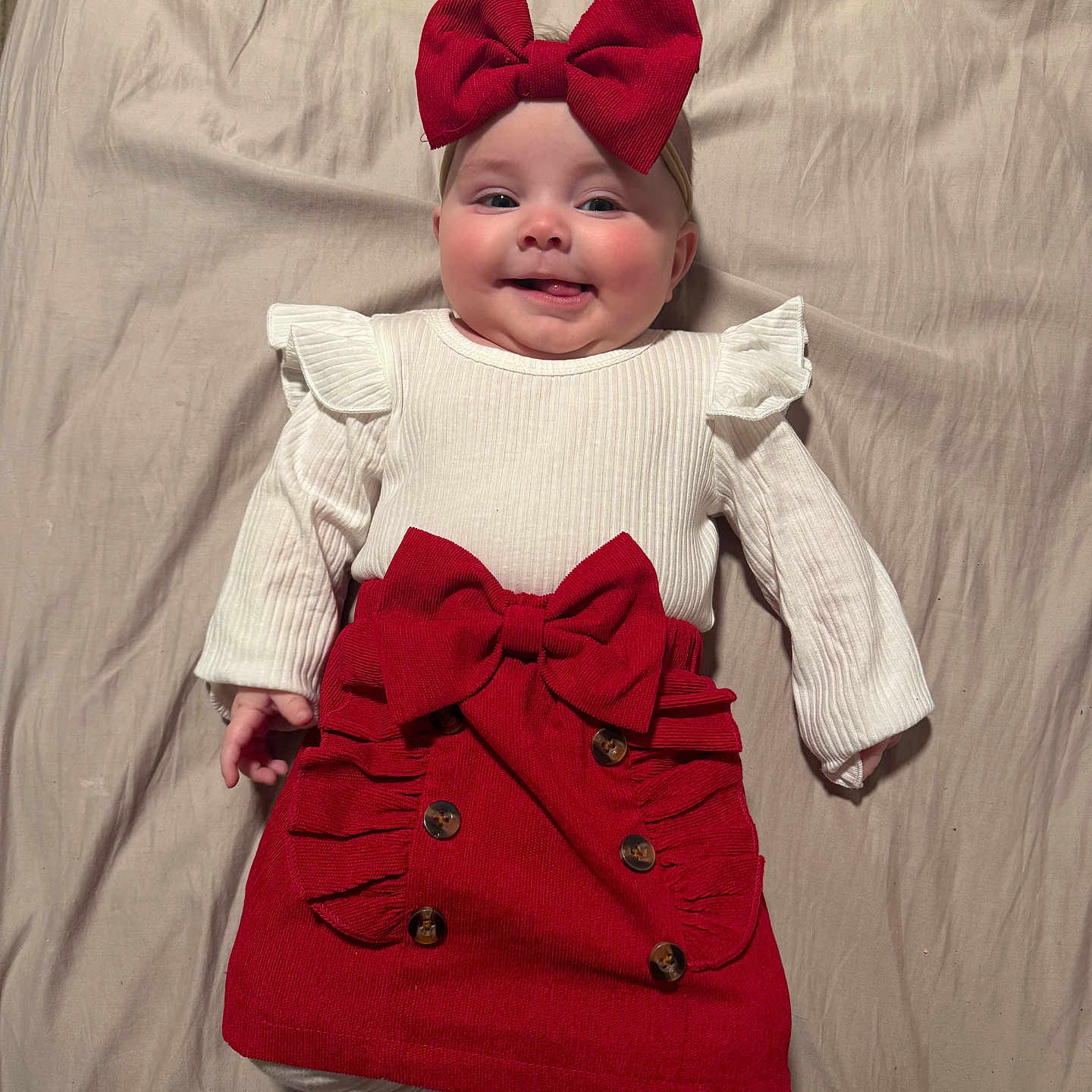 Siniyah is registered to the contest to win money with this photo: accessories, baby, clothing, coat, couch, dress, face, formalwear, furniture, happy, hat, head, hood, knitwear, pants, person, photography, portrait, smile, sweater