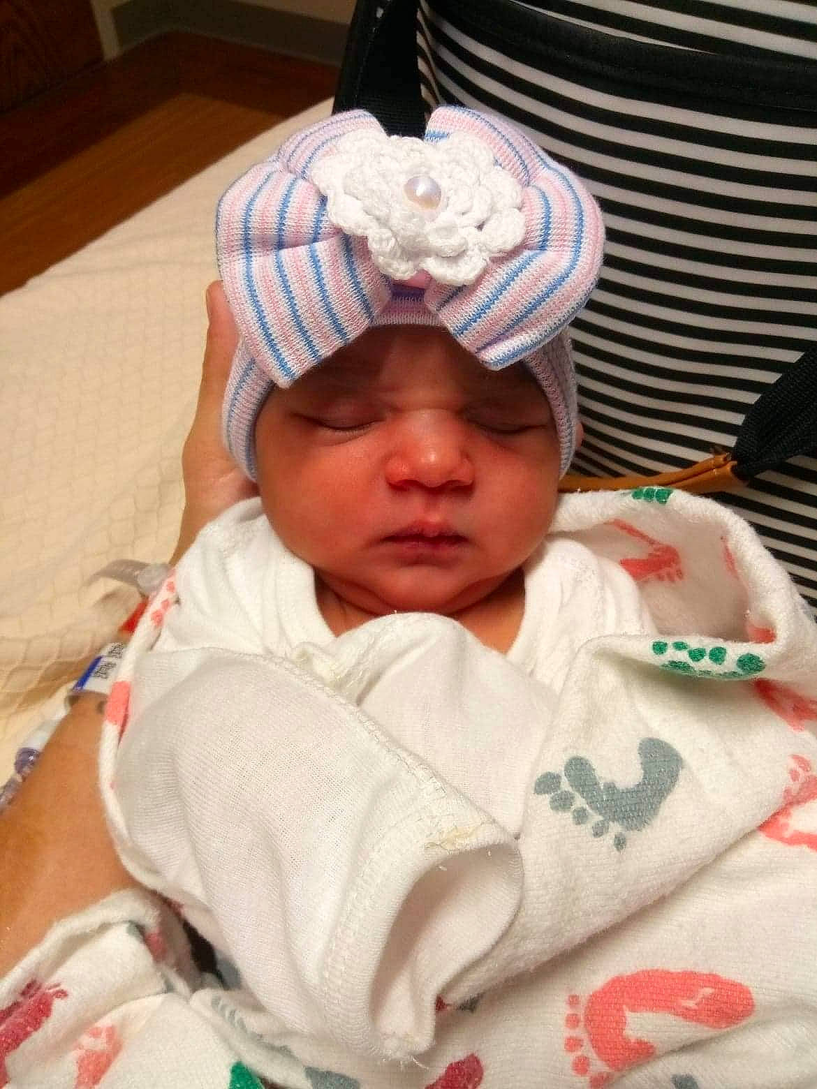 Arabella is registered to the contest to win money with this photo: baby, birth, child, headgear, headwear, person, toddler