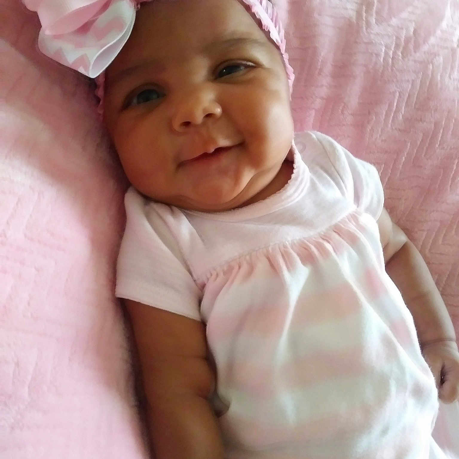 Arabella joined the competition — help win amazing prizes! baby, bonnet, cheek, child, fashion_accessory, hair_accessory, headgear, headwear, person, pink, skin, smile, toddler, white
