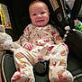 baby, infant, car_seat, smiling, onesie, plush_toy, cute, child, indoor, seat, clothing, happy, toy, face, person, infant_clothing, baby_girl, baby_boy, child_seat, comfort