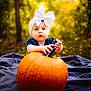 Raya joined the competition — help win amazing prizes! autumn, baby, blanket, bow, child, cute, daylight, fall, greenery, headband, holding, infant, leaf, nature, outdoor, portrait, pumpkin, seasonal, sitting, young