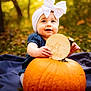 autumn, baby, blanket, bow, bright, child, cute, fall, happy, headband, nature, outdoor, person, portrait, pumpkin, seasonal, sign, sitting, smiling, young_child