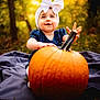 Raya joined the competition — help win amazing prizes! autumn, baby, blanket, bow, child, cute, daylight, fall, forest, greenery, happy, headwear, nature, outdoor, person, portrait, pumpkin, seasonal, sitting, smiling