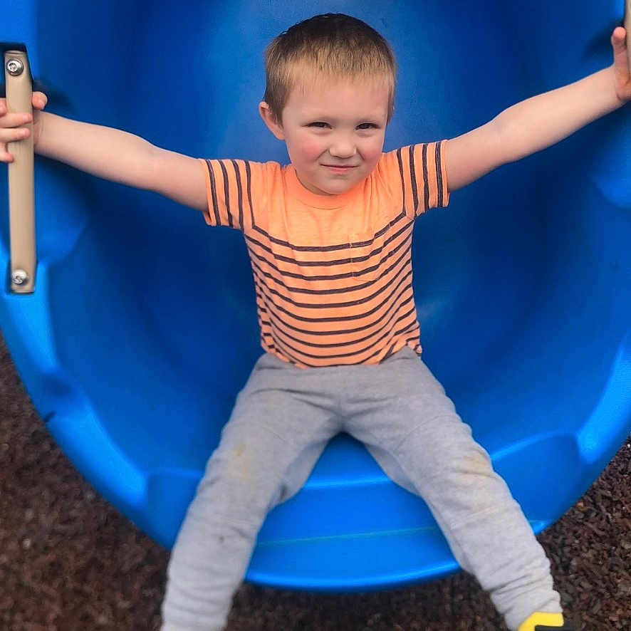 Franklin is registered to the contest to win money with this photo: bodypart, boy, child, clothing, face, finger, footwear, head, indoors, male, outdoorplayarea, outdoors, pants, person, photography, playarea, portrait, shoe, slide, toy
