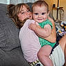 Ledger is registered to the contest to win money with this photo: baby, blanket, child, clothing, couch, cozy, curtain, cute, family, happy, home, hugging, indoor, lamp, portrait, relaxed, sitting, smiling, toddler, together