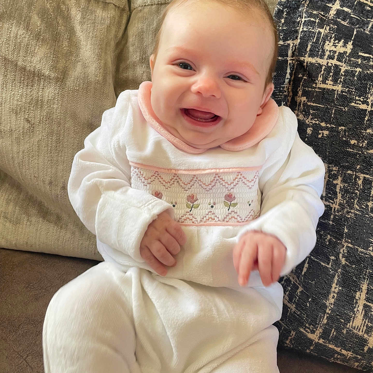 Billie-Mae is registered to the contest to win money with this photo: baby, babylaughing, clothing, cushion, face, happy, head, homedecor, laughing, pants, person, photography, portrait, sitting, smile