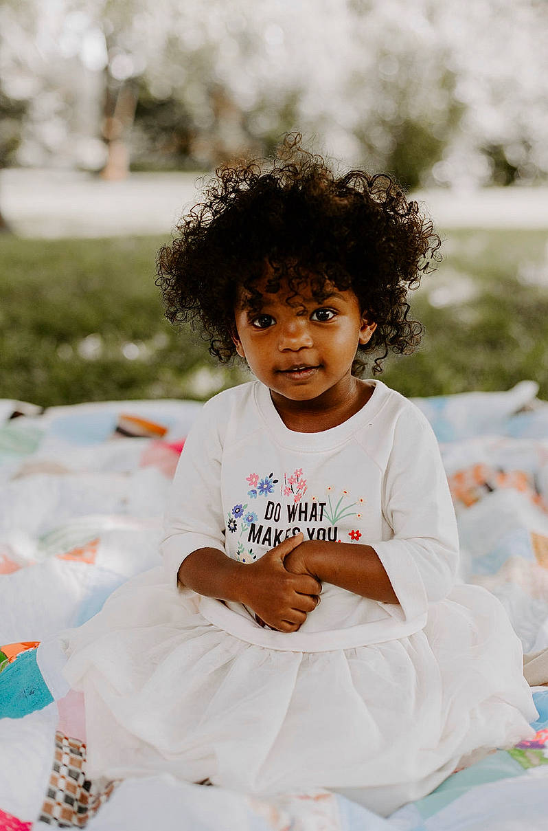 Anela joined the competition — help win amazing prizes! adaptation, afro, baby, child, fun, hair, hairstyle, leisure, person, photography, play, recreation, sitting, smile, summer, toddler, vacation