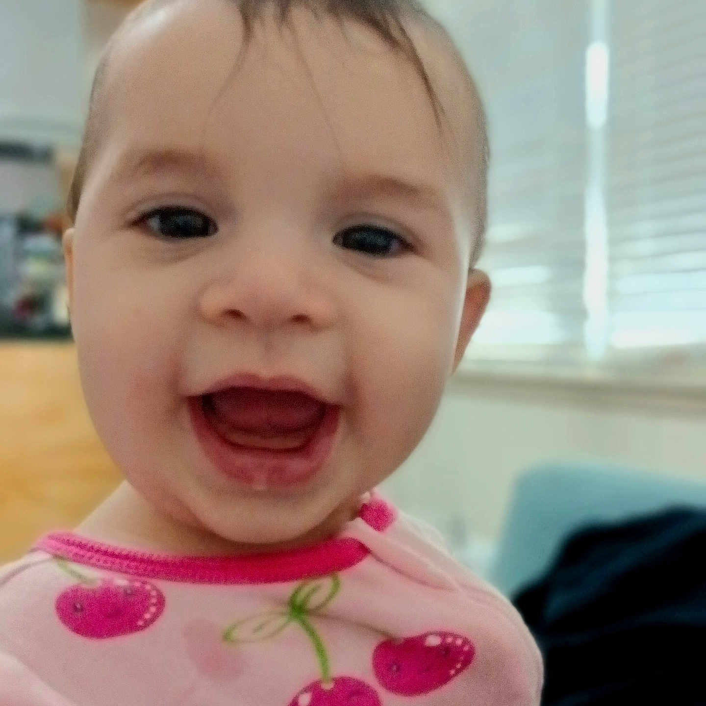 River is registered to the contest to win money with this photo: accessories, baby, babylaughing, bodypart, clothing, dress, face, happy, head, jewelry, laughing, mouth, newborn, person, photography, portrait, selfie, smile, t_shirt, teeth