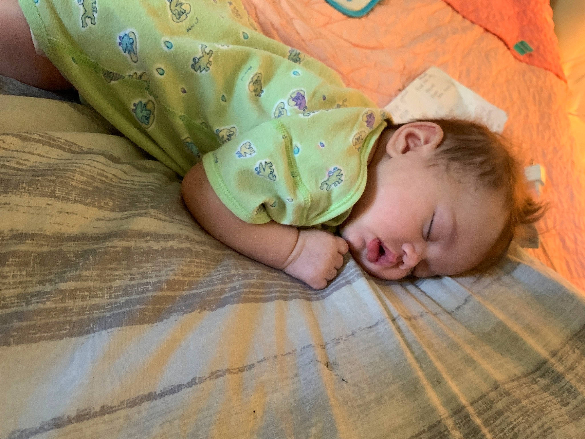 Aubriana joined the competition — help win amazing prizes! baby, baby_sleeping, baby_toddler_clothing, bedtime, cheek, child, comfort, flooring, grass, hardwood, linens, nap, pattern, person, sitting, skin, sleeve, toddler, tree, wood