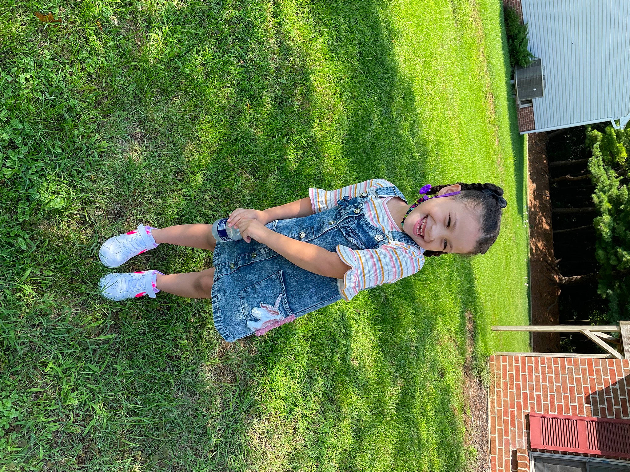 Jaylynn is registered to the contest to win money with this photo: baby, baby_toddler_clothing, fun, garden, grass, grass_family, grassland, happy, joy, lawn, leisure, meadow, people_in_nature, person, plant, recreation, shrub, sitting, smile, t_shirt
