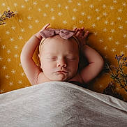 Willow joined the competition — help win amazing prizes! baby, bed, blanket, bodypart, cushion, face, finger, flower, flowerarrangement, flowerbouquet, furniture, hand, head, homedecor, newborn, person, photography, plant, portrait, sleeping