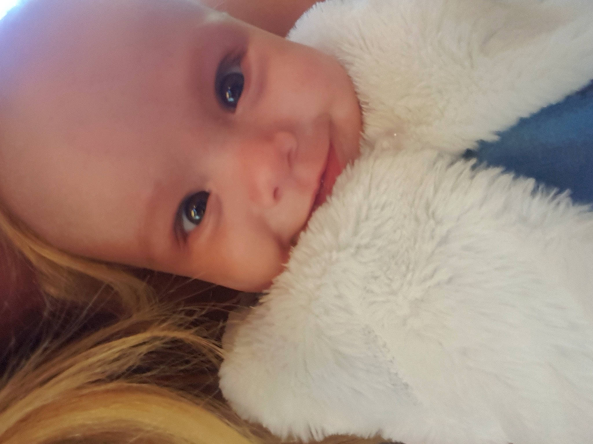 Elynn participe au concours pour gagner de l'argent avec cette photo : baby, child, comfort, companion_dog, ear, eyelash, fawn, felidae, fur, fur_clothing, happy, iris, lip, nose, person, skin, small_to_medium_sized_cats, stuffed_toy, toddler, toy