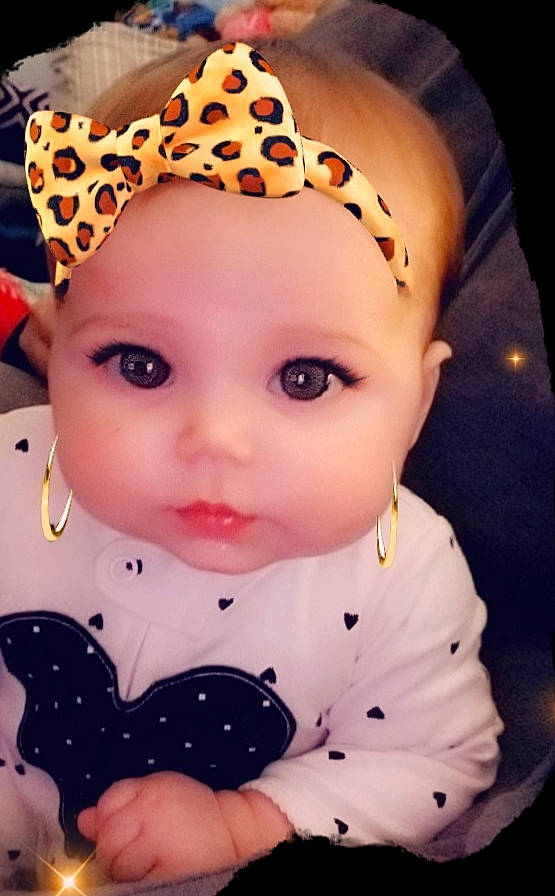 Amelia is registered to the contest to win money with this photo: baby, baby_toddler_clothing, cheek, child, design, ear, fashion_accessory, forehead, hair_accessory, head, headband, headgear, headpiece, lip, pattern, person, polka_dot, toddler