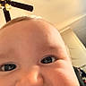 baby, ceiling_fan, cheeks, child, closeup, curious, cute, expression, eyes, face, head, indoor, infant, light, nose, person, photography, portrait, skin, young