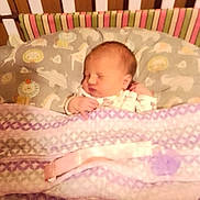 Stormi Dallas joined the competition — help win amazing prizes! newborn, baby, sleeping, crib, blanket, bedding, animal_print, toddler, infant, bedroom, child, cute, peaceful, sleep, soft, pattern, colorful, pajamas, indoors, rest