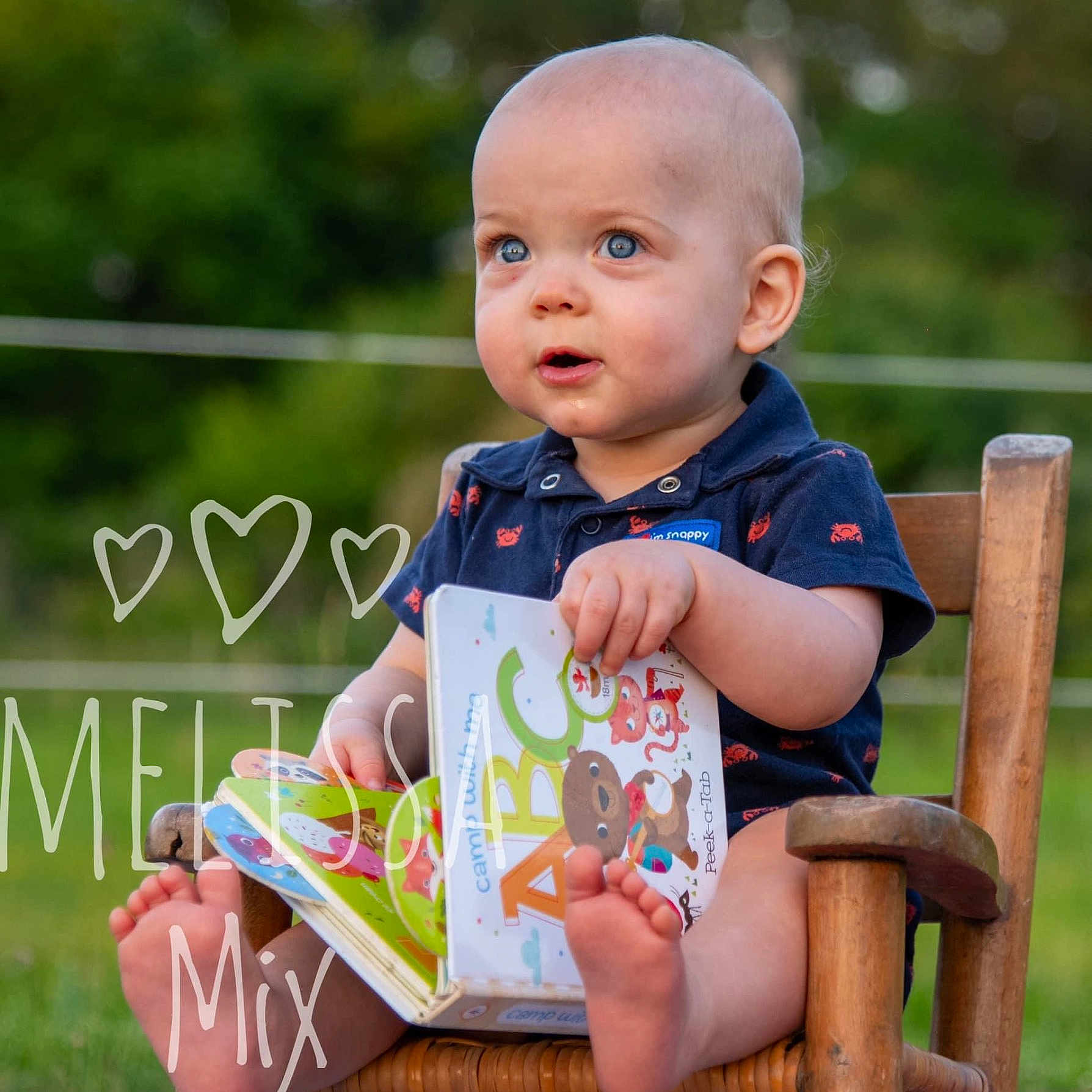 Zeppelin joined the competition — help win amazing prizes! baby, bodypart, book, chair, clothing, face, finger, furniture, grass, hand, head, pants, person, photography, plant, portrait, publication, reading, sitting, t_shirt