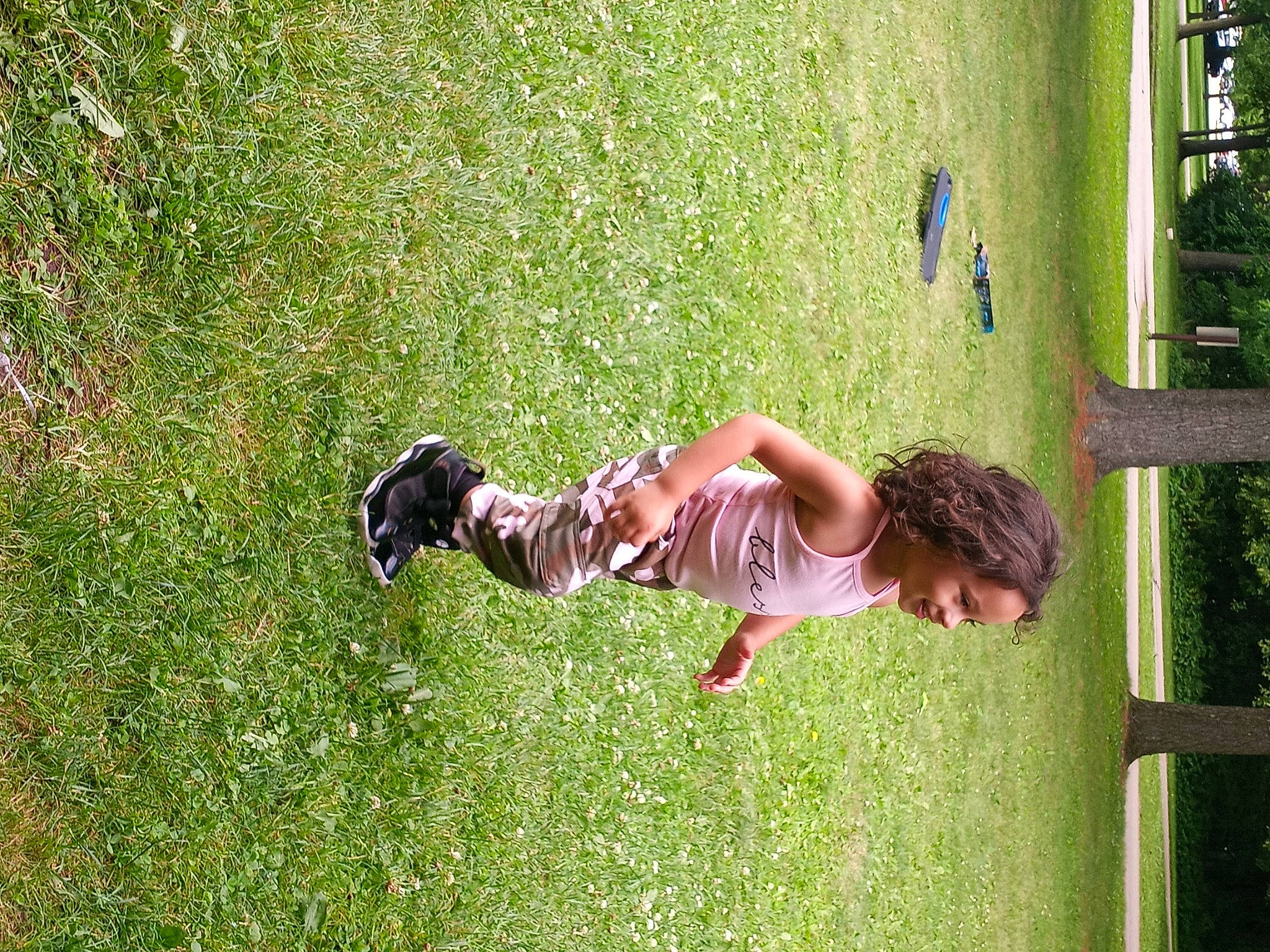 Layla is registered to the contest to win money with this photo: baby, botany, fun, grass, grass_family, grassland, groundcover, happy, joy, leisure, mammal, meadow, natural_environment, people_in_nature, person, plant, tints_and_shades, toddler, tree, vertebrate