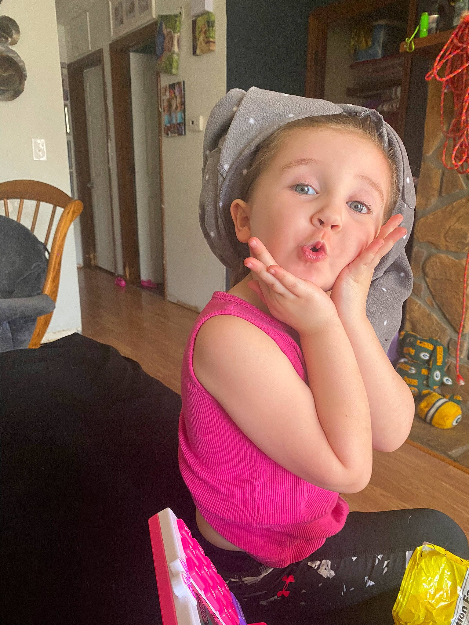 Rosalee is registered to the contest to win money with this photo: baby, baby_toddler_clothing, cap, chair, child, event, fashion_accessory, flooring, fun, happy, lap, leisure, magenta, party, person, pink, play, room, sitting, toddler