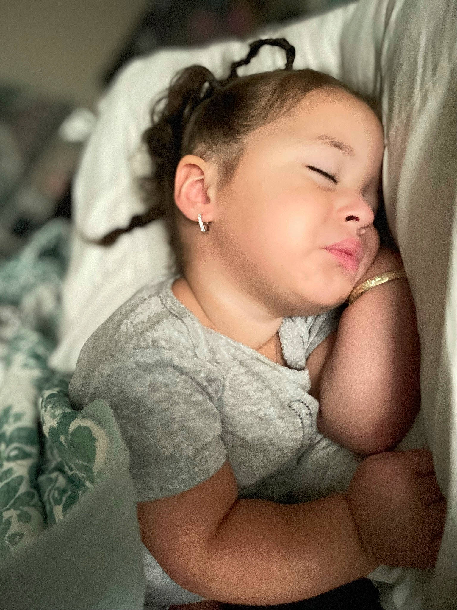 Serenity is registered to the contest to win money with this photo: baby, black_hair, child, comfort, dress, elbow, event, eyelash, face, flash_photography, gesture, happy, iris, lip, long_hair, neck, person, shoulder, sitting, skin