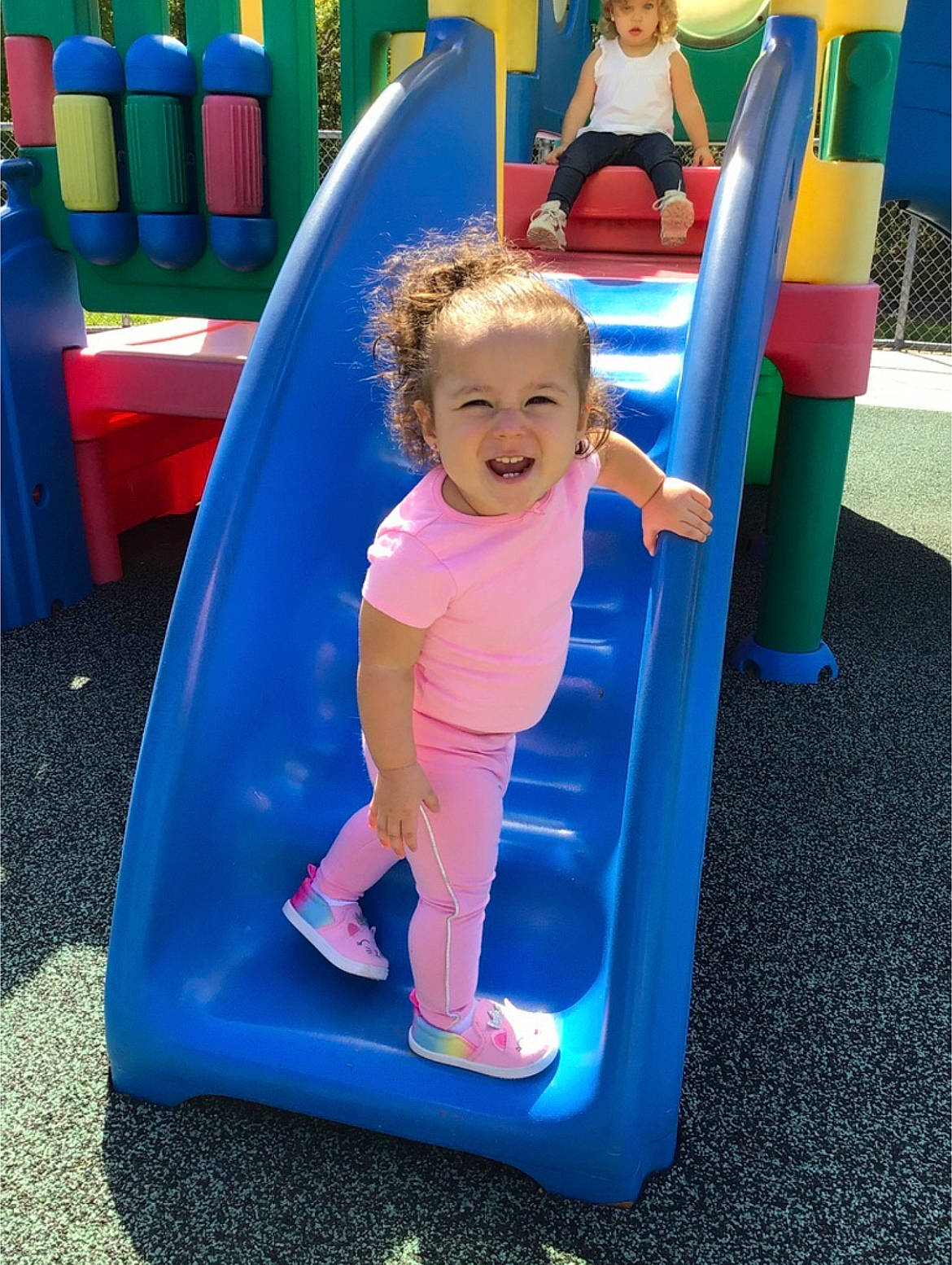 Serenity joined the competition — help win amazing prizes! baby_toddler_clothing, blue, child, chute, city, clothing, electric_blue, fun, headwear, leisure, magenta, outdoor_play_equipment, person, photograph, photography, play, playground, playground_slide, recreation, smile