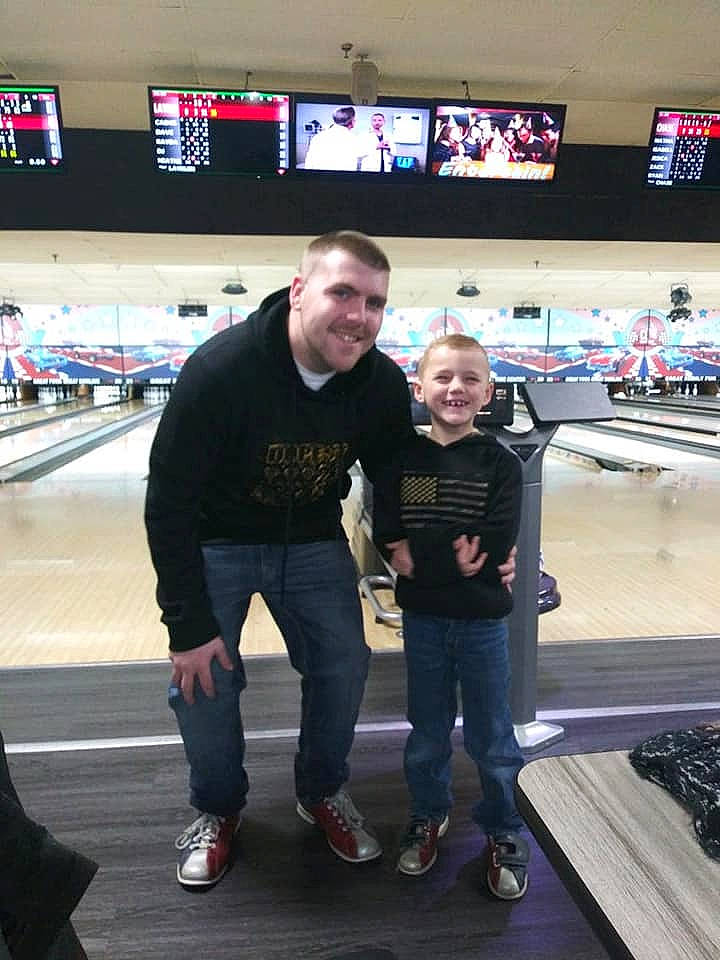 Kaydan is registered to the contest to win money with this photo: bowler, bowling, bowling_equipment, competition_event, fun, games, individual_sports, joy, person, t_shirt, team, ten_pin_bowling