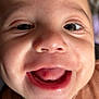 Kais participe au concours pour gagner de l'argent avec cette photo : baby, close_up, smile, happy, face, tongue, eyes, infant, child, cute, expression, mouth, skin, person, head, young, portrait, brown_clothing, joy, cheeks