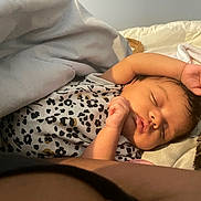 Alayah joined the competition — help win amazing prizes! baby, sleeping, infant, blanket, leopard_print, onesie, arm, face, peaceful, soft_lighting, resting, closeup, skin, bed, comfort, indoors, portrait, newborn, cute, relaxation