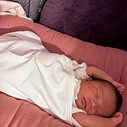 Leilani Rose joined the competition — help win amazing prizes! newborn, baby, sleeping, blanket, white_clothing, pink_cushion, soft_texture, infant, peaceful, resting, cozy, portrait, indoor, child, cute, wrapped, relaxed, small_hands, face, head