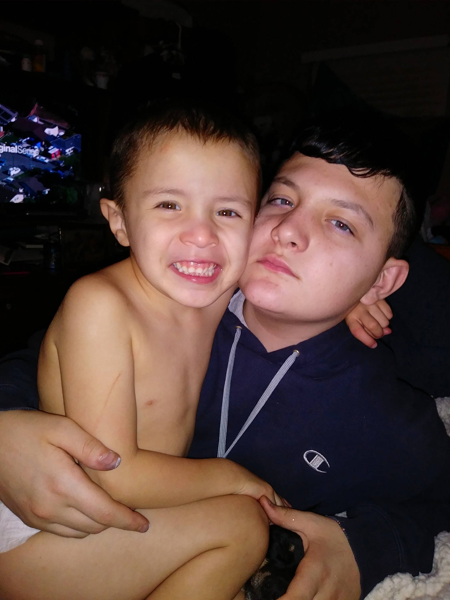 Clayton is registered to the contest to win money with this photo: cheek, child, daughter, face, finger, fun, gesture, hand, happy, hug, interaction, joy, leg, love, mother, muscle, person, skin, smile, thumb