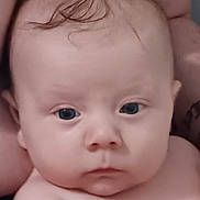 Remington joined the competition — help win amazing prizes! baby, infant, face, skin, hair, closeup, child, person, portrait, expressionless, newborn, human, cute, small, head, eyes, arms, holding, indoors, soft