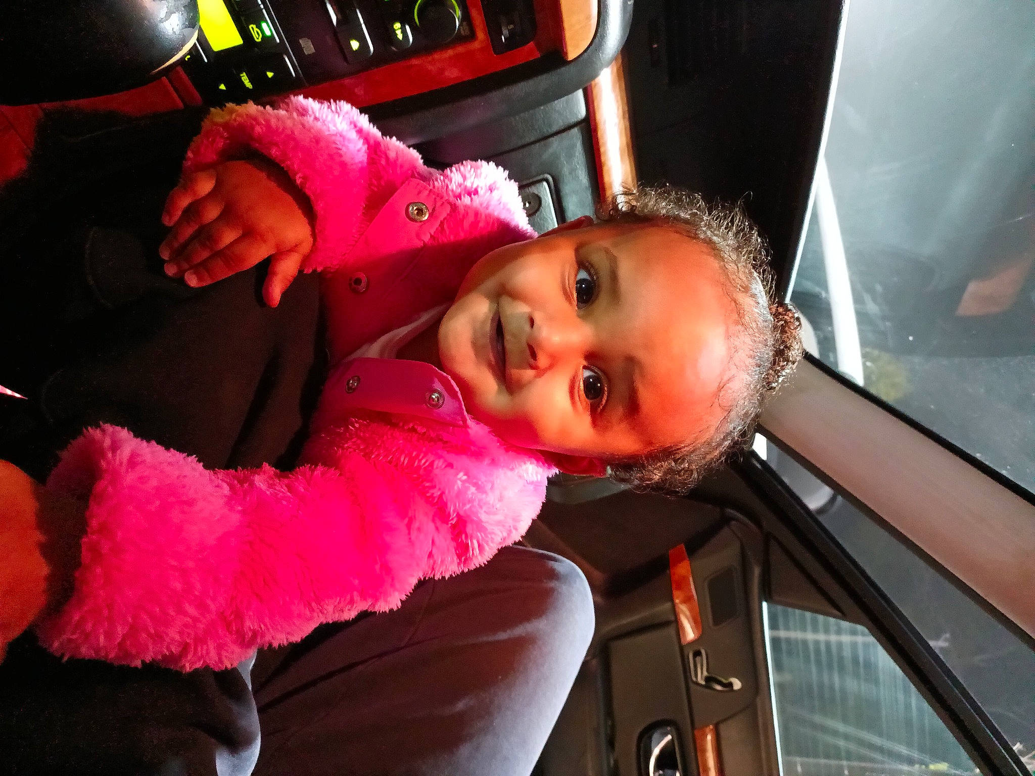 Anastacia is registered to the contest to win money with this photo: auto_part, automotive_design, automotive_exterior, automotive_lighting, baby, bumper, car, child, eyebrow, eyelash, fun, happy, joy, leisure, luxury_vehicle, magenta, person, pink, smile, toddler