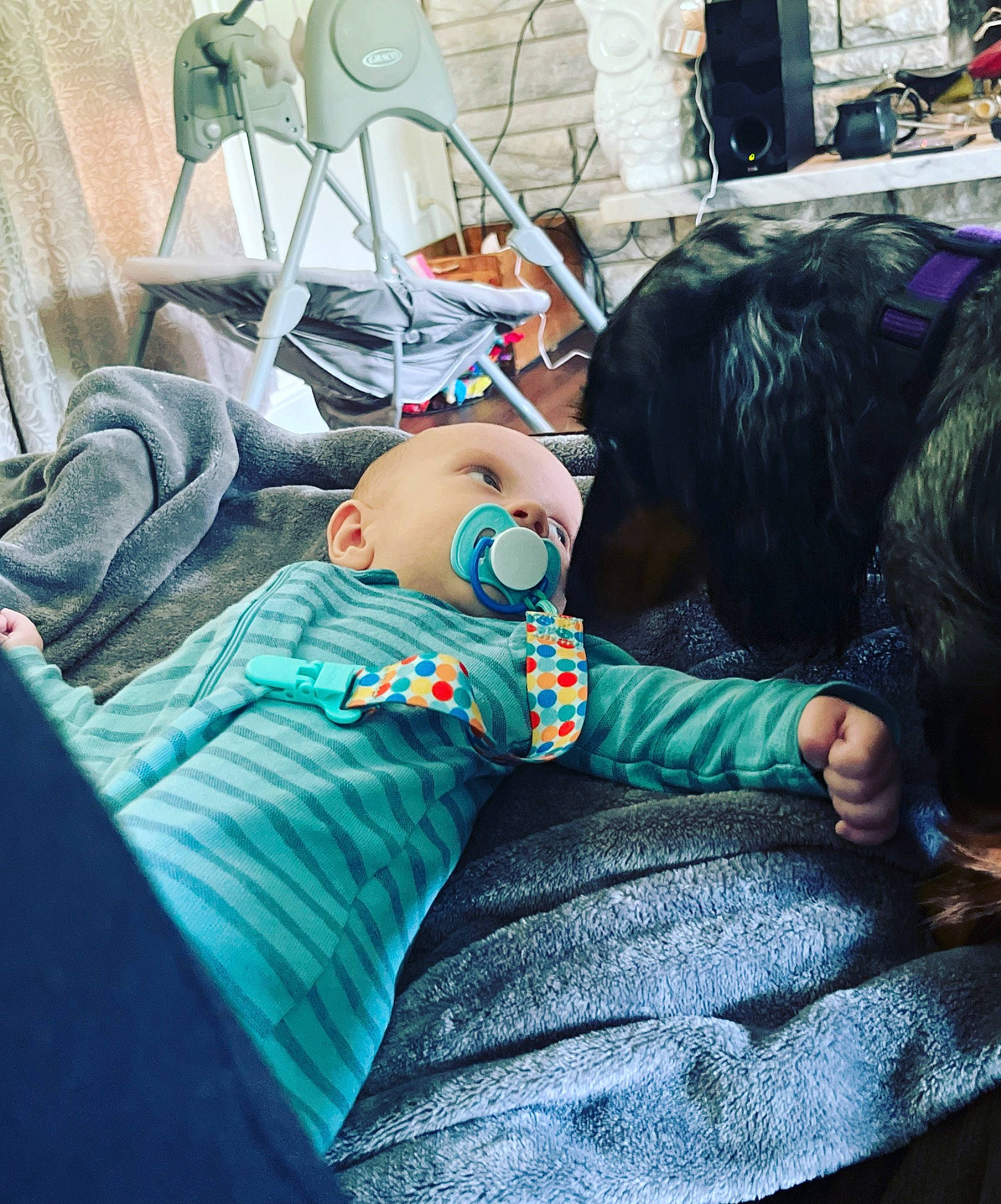 Emerson is registered to the contest to win money with this photo: baby, bag, bedding, child, comfort, couch, denim, human_leg, leisure, linens, luggage_and_bags, nap, person, room, sitting, sleep, street, t_shirt, textile, thigh