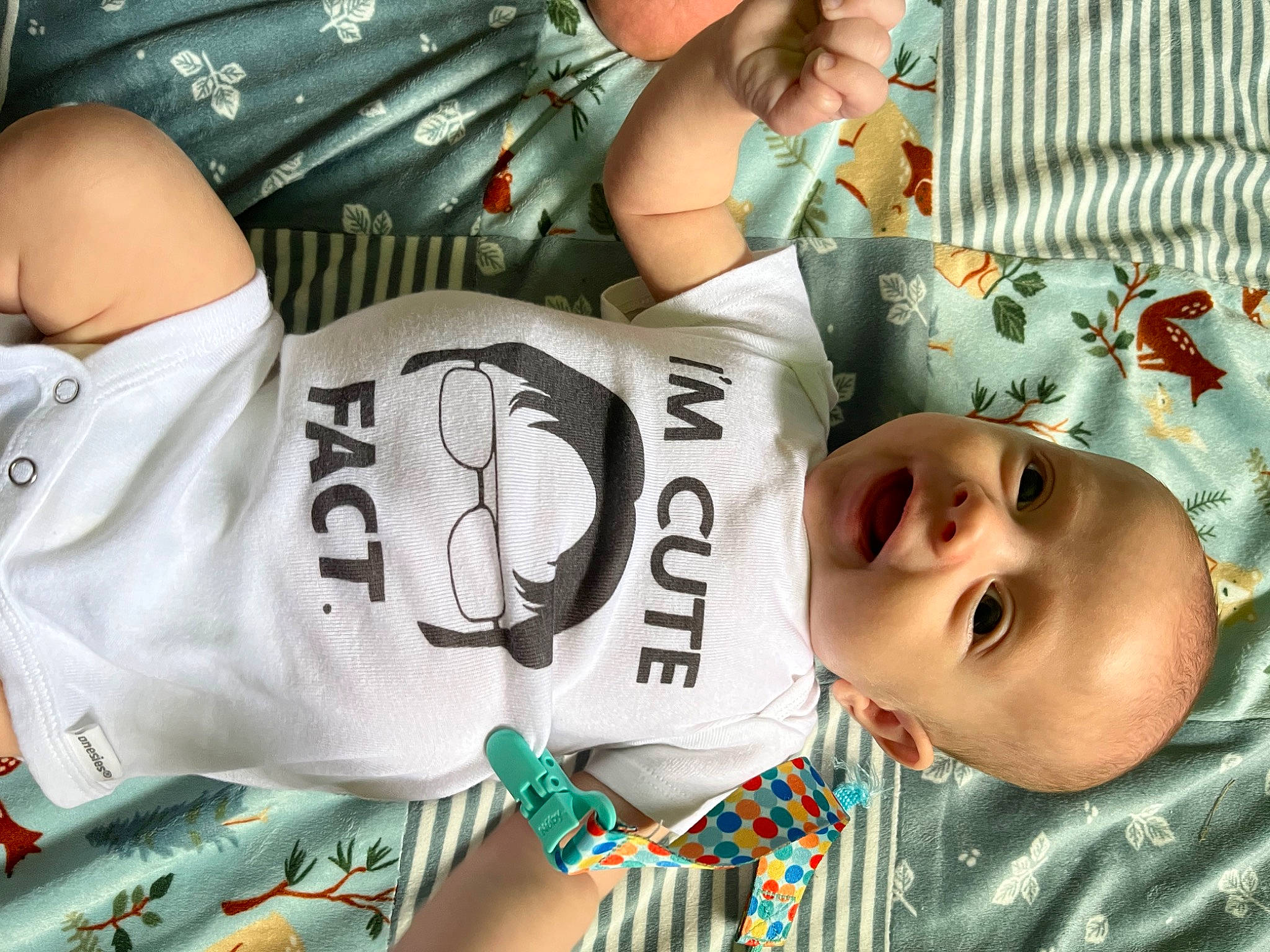 Emerson joined the competition — help win amazing prizes! baby_toddler_clothing, cheek, child, comfort, cool, facial_expression, happy, headgear, human_body, human_leg, linens, mammal, mouth, pattern, person, sleeve, smile, textile, thigh, toddler