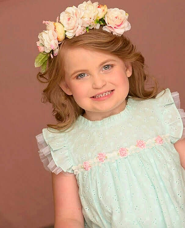 Elizabeth joined the competition — help win amazing prizes! baby_toddler_clothing, day_dress, dress, embellishment, eyelash, face, flash_photography, flower, happy, head, headgear, headpiece, iris, joy, neck, person, petal, pink, skin, sleeve