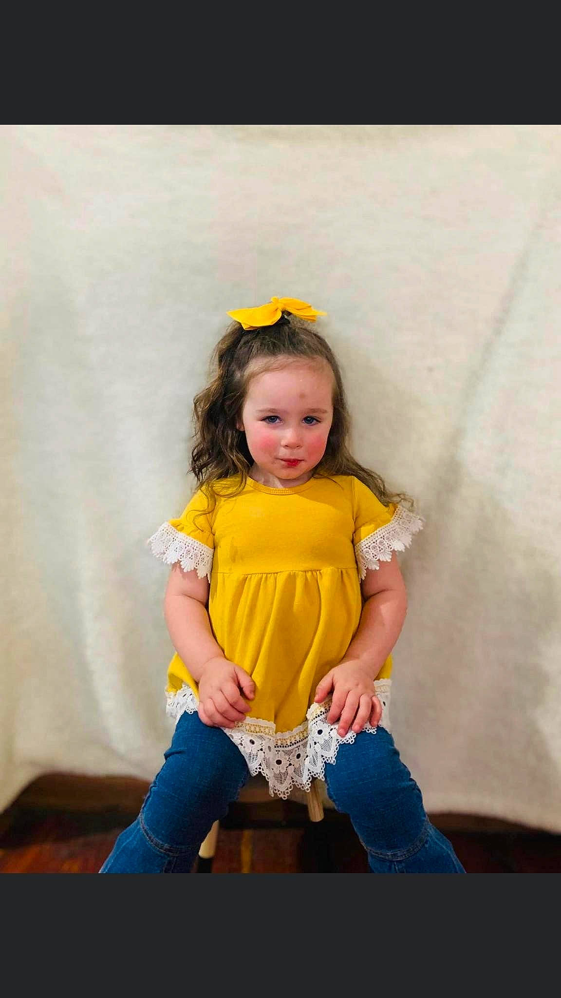 Remmi is registered to the contest to win money with this photo: baby_toddler_clothing, child, denim, facial_expression, fashion_design, flash_photography, fun, hairstyle, happy, iris, jeans, magenta, pattern, person, portrait, portrait_photography, sitting, skin, sleeve, t_shirt