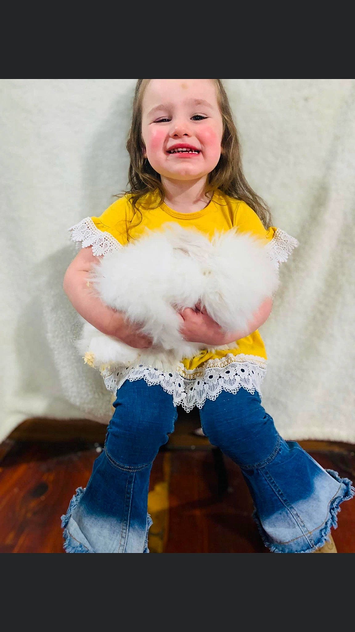 Remmi is registered to the contest to win money with this photo: abdomen, baby_toddler_clothing, blond, chair, cheek, child, clothing, flash_photography, fun, hair, happy, head, iris, joy, person, skin, sleeve, smile, t_shirt, textile