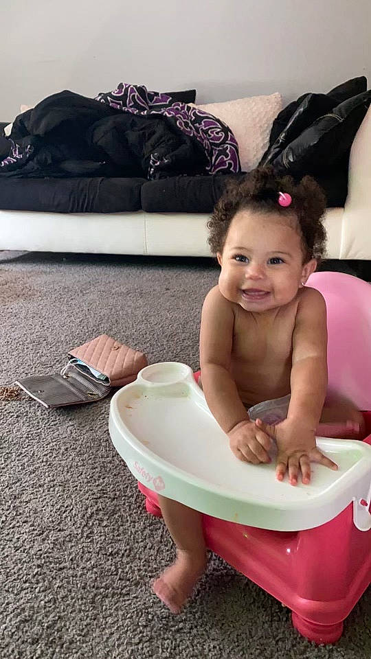 Amiya joined the competition — help win amazing prizes! baby, baby_toddler_clothing, child, comfort, couch, cushion, flip_flops, foot, home_accessories, joy, living_room, person, pillow, pink, slipper, sofa_bed, studio_couch, throw_pillow, toddler
