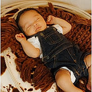 Elijah joined the competition — help win amazing prizes! baby, infant, sleeping, newborn, overalls, denim, blanket, knitted_blanket, basket, cozy, nap, peaceful, portrait, soft_texture, cute, hands, legs, indoor, brown, photography